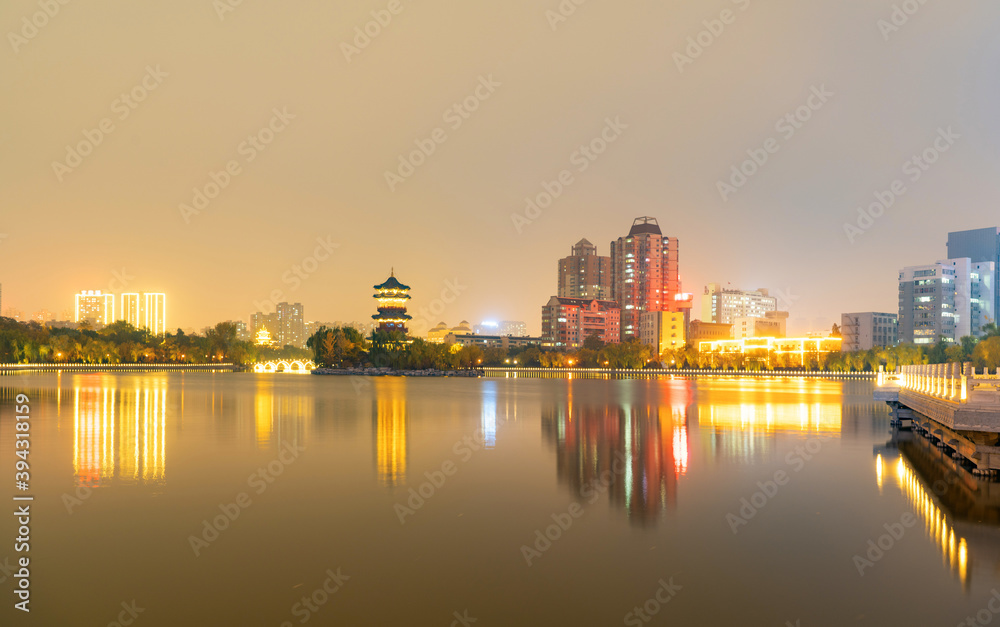 At night, the city skyline is in Taiyuan, Shanxi Province, China