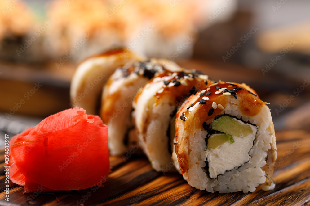 Still life with appetizing rolls. Japanese food concept. Close-up.