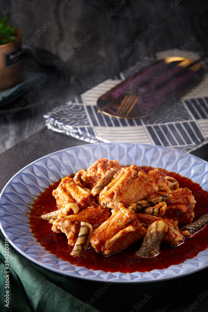 Delicious Chinese food, snake meat in spicy sauce Delicious Chinese food, snake meat in spicy sauce