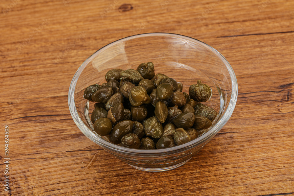 Tasty capers in the bowl Tasty capers in the bowl