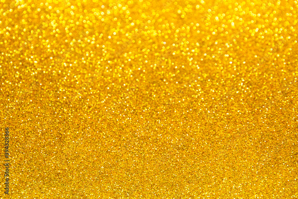 Gold glitter and bokeh background. Abstract texture background.