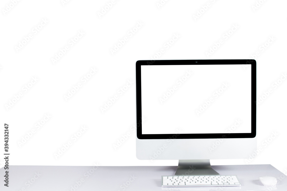 Computer monitor isolated on white screen on office style desk clipping path. Computer monitor isolated on white screen on office style desk clipping path.