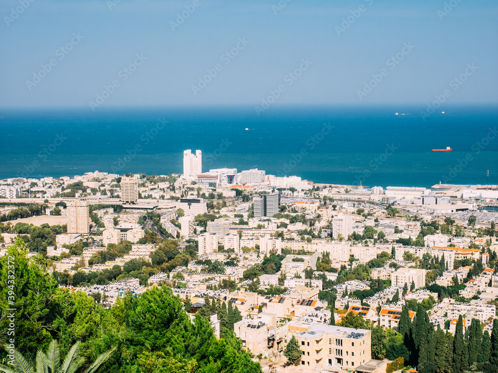 Beautiful panoramic view from Mount Carmel to cityscape and port in Haifa, Israel.