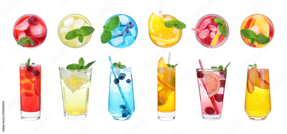 Fototapeta premium Set of different lemonade drinks made with soda water on white background, top and side view. Banner design