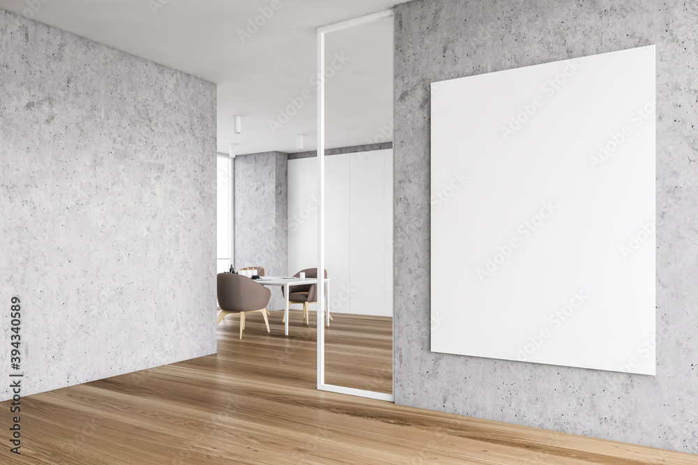 White and concrete meeting room corner with poster White and concrete meeting room corner with poster