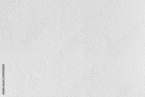 Close up subtle surface texture of a white painted bedroom wall