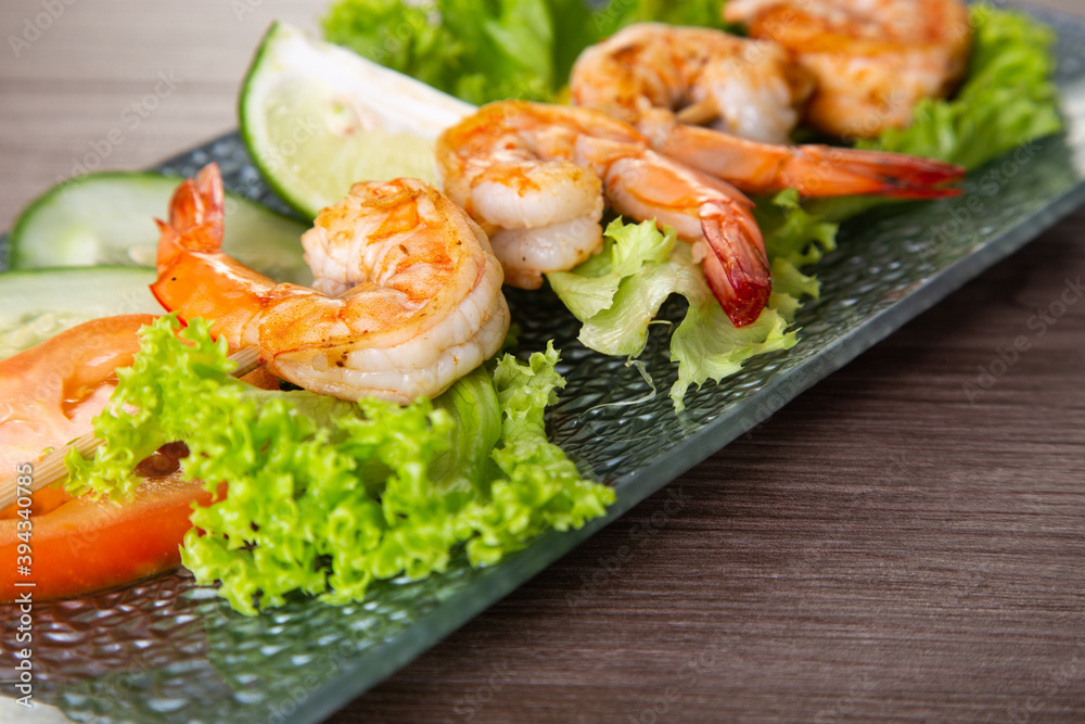 Skewers Barbeque grilled prawns on wooden table Skewers Barbeque grilled prawns on wooden table
