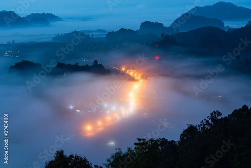 Morning fog over the mountain valley at Khao Na Nai Luang Dharma Park, Surat Thani province, Thailand