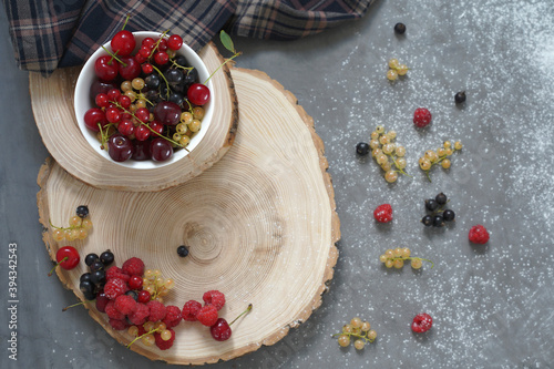 fresh harvest of berries on a rustic table