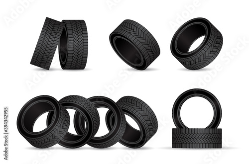 Realistic tire fitting vector design. Black rubber wheels tyres for car service station.