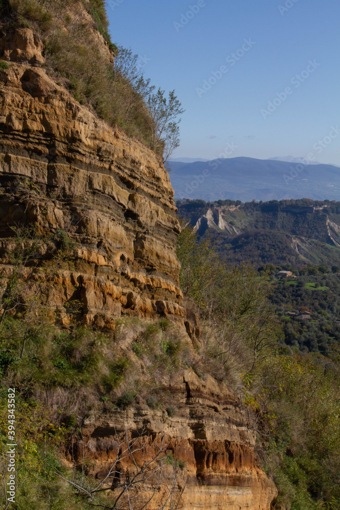 Pattern layers of Civita di Bagnoregio hill town,two different formations of rocks,ancient formation is clay and The top layers are made up of tuff and lava material.formed by landslides and erosion.