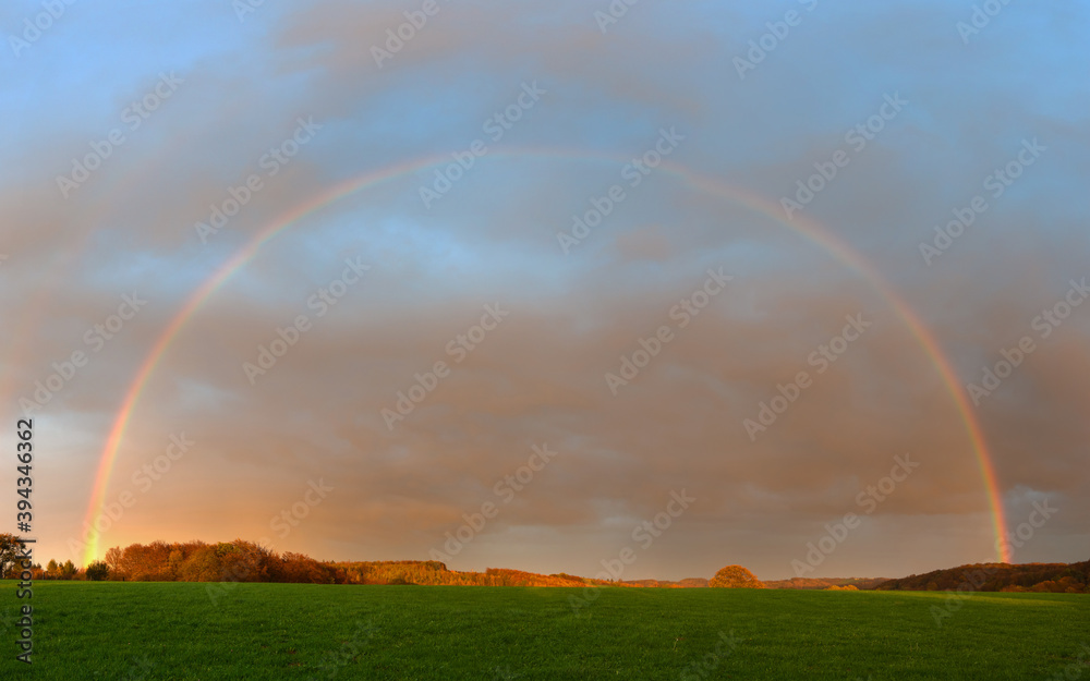 Naklejka premium Landscape with rainbow