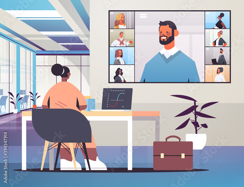 african american businesswoman discussing with businesspeople during corporate online conference mix race team working by group video call office interior horizontal vector illustration
