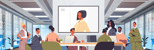 businesspeople having online conference mix race business people discussing with businesswoman during video call office meeting room interior horizontal portrait vector illustration