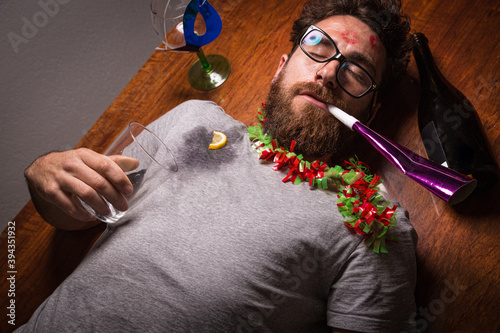 Canvas Print Boy with a hangover after a New Year's Eve party