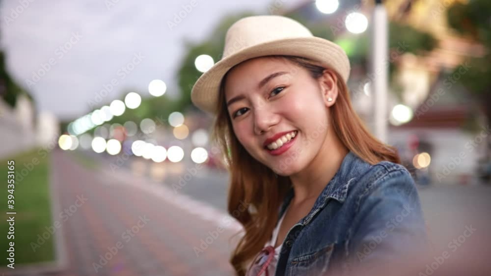 Traveler Asian blogger women travel in Bangkok, Thailand, beautiful female using mobile phone make vlog and live in social media .woman tourist making video call with smartphone while traveling .