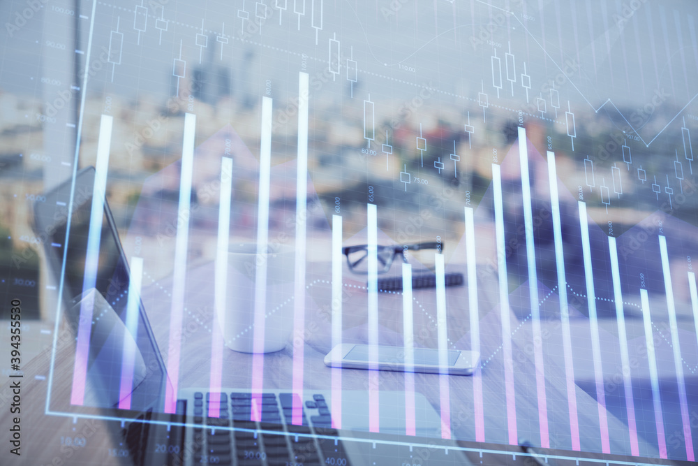 Stock market graph and table with computer background. Double exposure. Concept of financial analysis. Stock market graph and table with computer background. Double exposure. Concept of financial analysis.