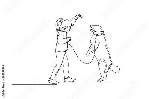 Continuous line drawing of happy little girl playing with dog pet. One line art concept of happy childhood. Vector illustration