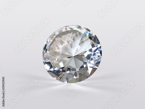 Round cut diamond on white glossy background