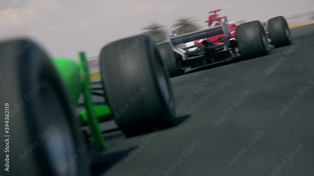 Dynamic rear view of a generic green formula one race car chasing the leader - realistic high quality 3d animation - my own car design - no copyright/trademark infringement