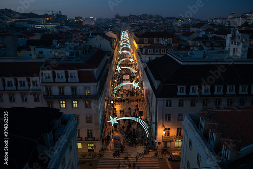 High angle view from above to Rua Augusta street in Lisbon at night illuminated with falling stars during Christmas time