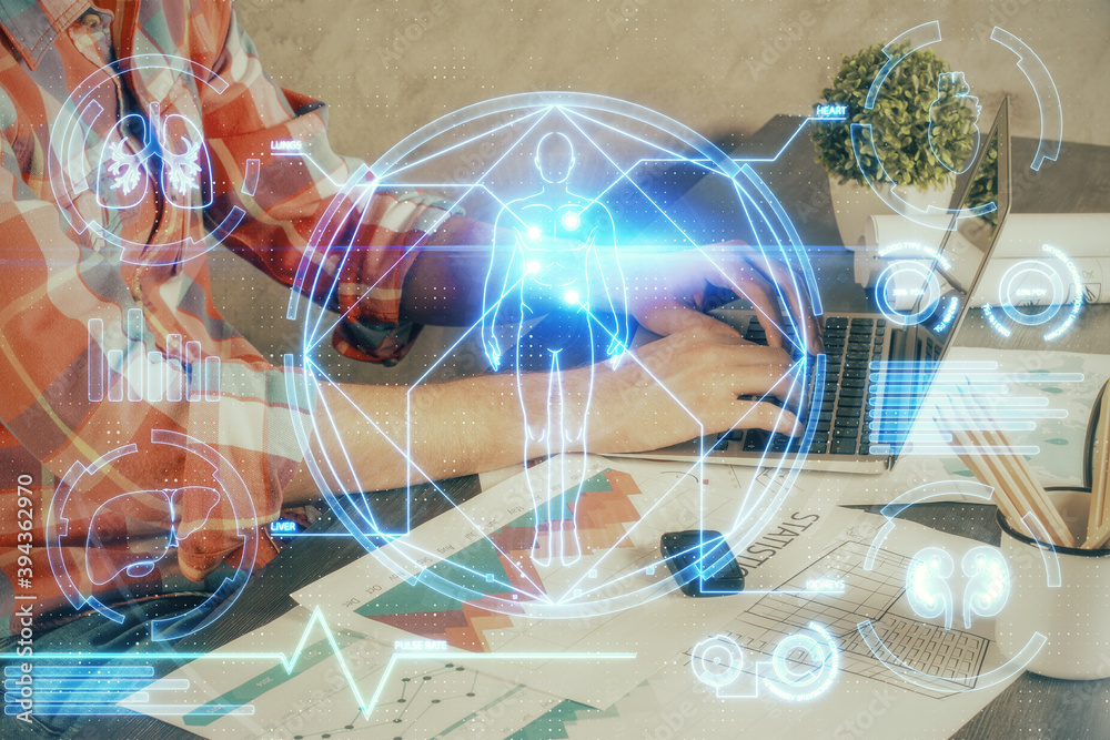 Science hologram with man working on computer on background. Concept of study. Double exposure. Science hologram with man working on computer on background. Concept of study. Double exposure.