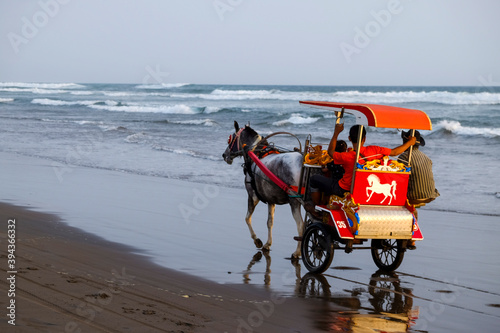 Delman or Dokar is a traditional vehicles that have been replaced by engines, can be found on the coast of Yogyakarta photo
