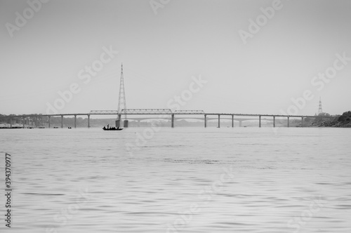 Panoramic View of the River Ganga with Bridge Over It in Black & White