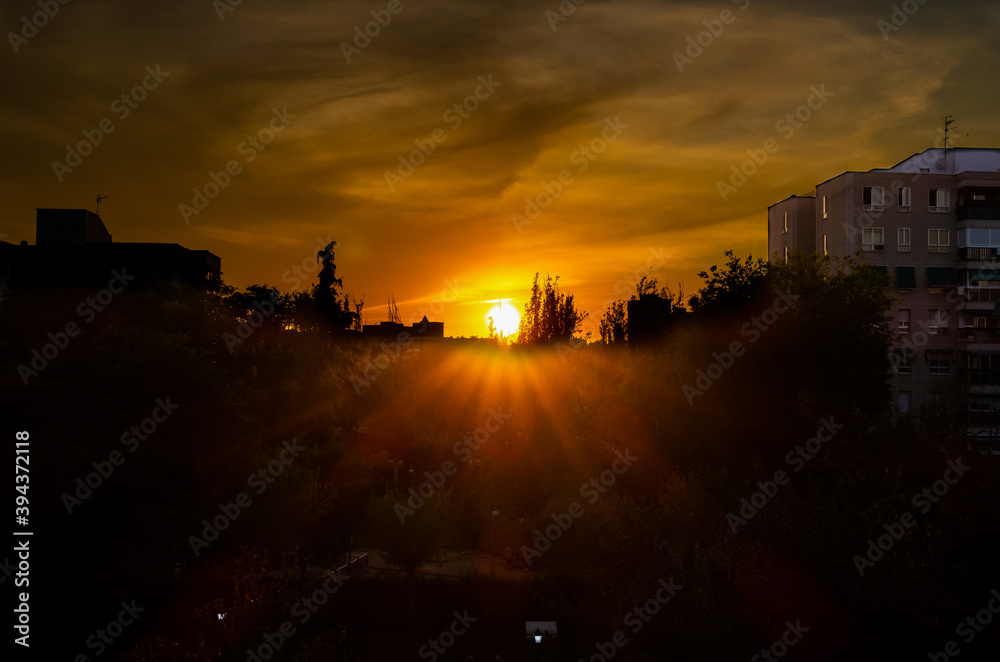 Obraz premium Sunrise business tower silhouette in Madrid