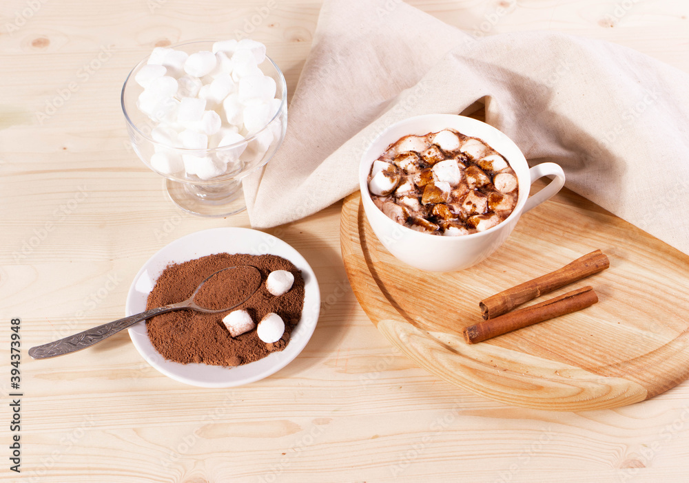 tasty sweet hot chocolate in a cup and mini marshmallows