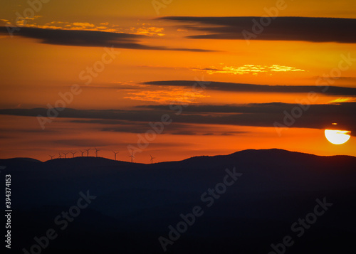 Orange sky with mountain and wind turbing horizon
Mount Olga Wilmington Vermont Nov. 2020 photo