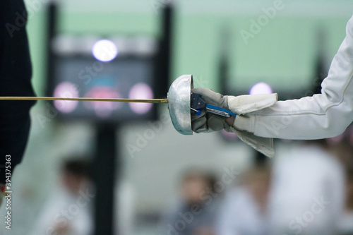 Fencing white gloves with epee