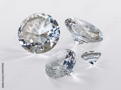 Round cut diamond on white glossy background