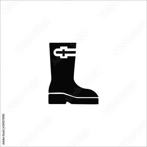 Simple black vector boots icon isolated on white