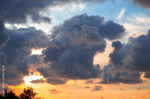 dark dense clouds at sunset in autumn, beautiful dramatic background