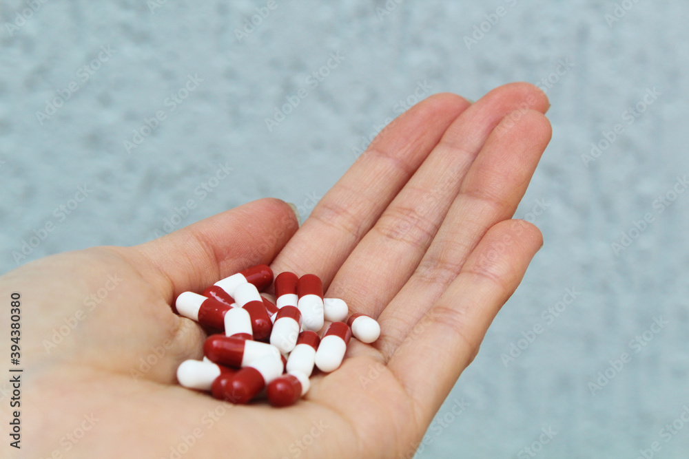 Hand holding pills - Medicine, prescription drugs Hand holding pills - Medicine, prescription drugs