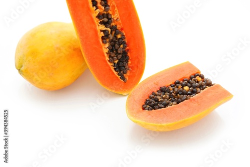 Ripe papaya on a white background
