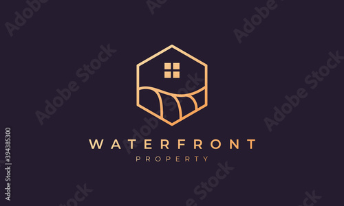 real estate logo with a hexagon base shape with ocean wave and window