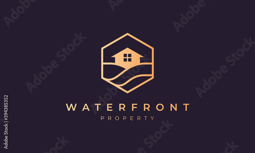 hotel logo with a hexagon base shape with ocean wave and window