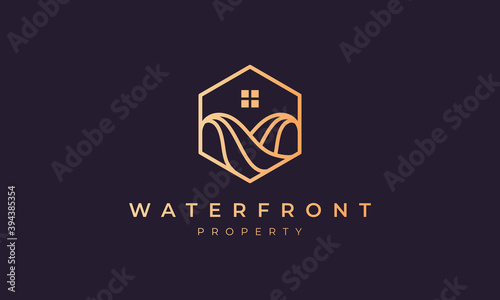 property agent logo with a hexagon base shape with ocean wave and window photo