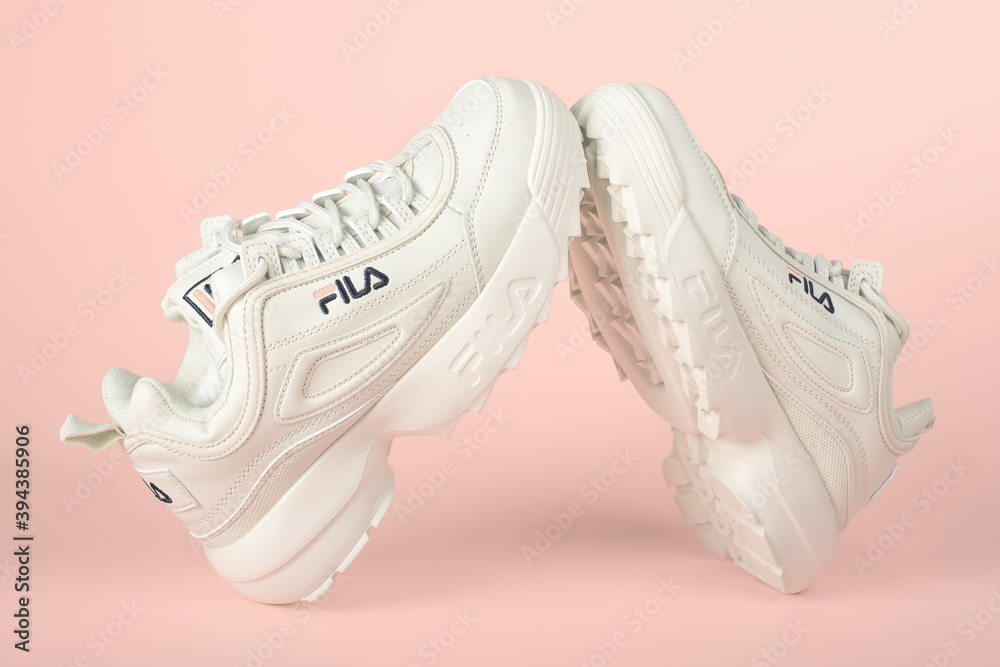 MOSCOW RUSSIA NOVEMBER 18 2020 Fila shoe model disruptor 2 white popular Fila is one of the world s largest sportswear manufacturing companies. Studio shot isolated on pink background. Stock Photo Ado...