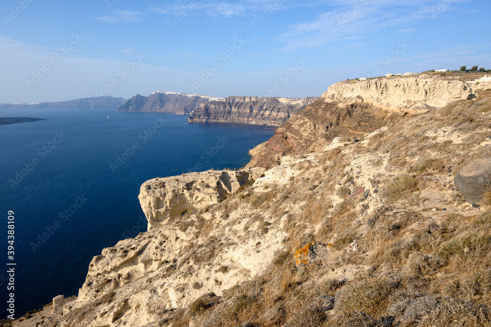 The coast of Santorini Island in Greece, impressive volcanic cliffs and a view of the caldera. Cyclades Islands