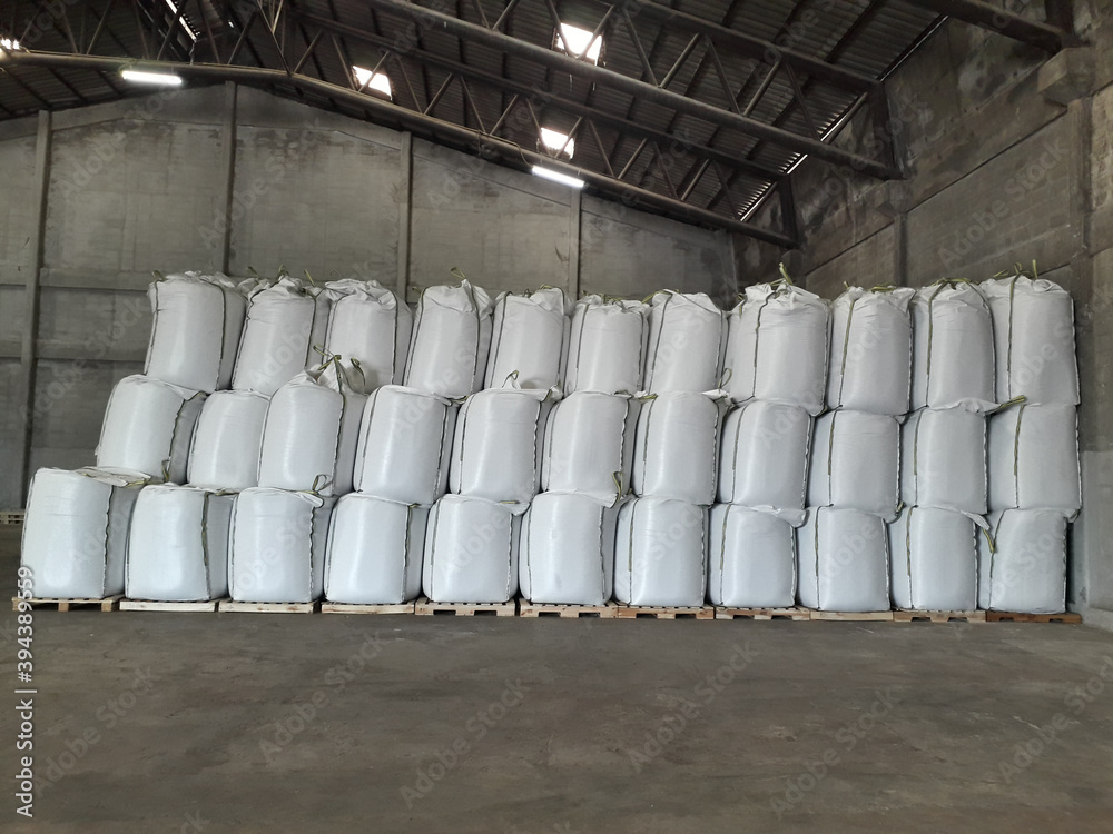 Chemical fertilizer Urea Stockpile jumbo-bag in a warehouse waiting for shipment. Chemical fertilizer Urea Stockpile jumbo-bag in a warehouse waiting for shipment.