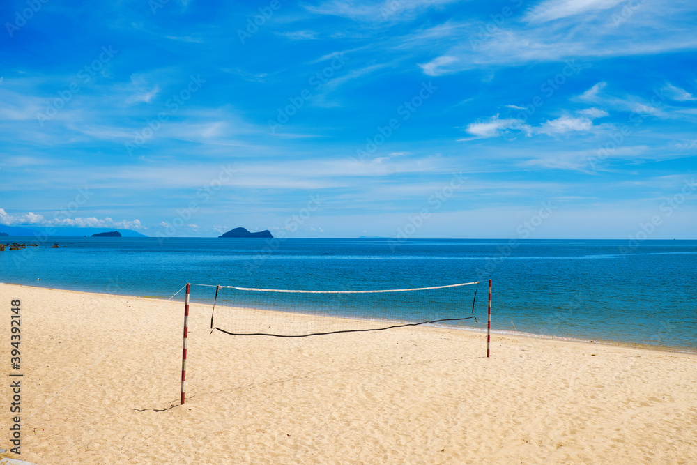 Deserted beach with volleyball court 