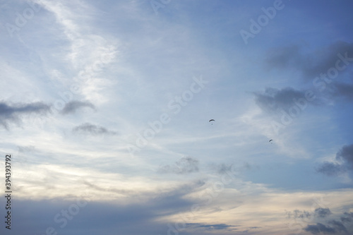 The emptiness and freedom of the blue sky and clouds with copy space for banner or wallpaper background © Fai