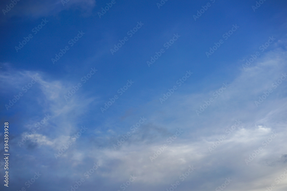 Soft clouds and blue sky with copy space for banner or wallpaper background