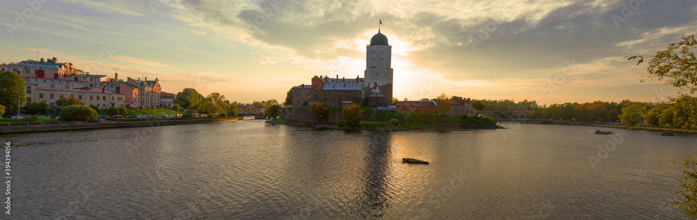 Vyborg Castle against the backdrop of an October sunset. Leningrad region, Russia