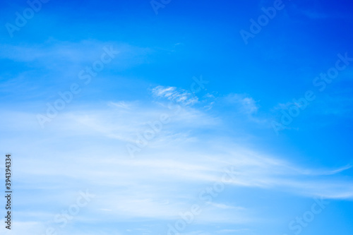 Fototapeta Naklejka Na Ścianę i Meble -  White clouds on blue sky with copy space for banner or wallpaper background. freedom concept