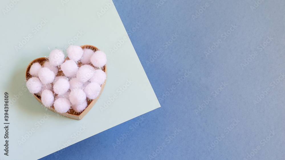 Gift box with fluffy decorative snowflakes on the bicolor blue paper background. Base design for christmas greeting card. Gift box with fluffy decorative snowflakes on the bicolor blue paper background. Base design for christmas greeting card.
