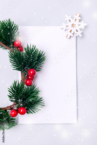 Holiday Christmas Mock Up With White Form Christmas Wreath and Fake Snow Flake Holiday Card Vertical Top View Place for Text